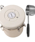 Solid Stainless Steel Coffee Bean Storage Jar Set With Airtight Lid To Keep Your Daily Grind Fresh with measuring scoop.