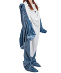 Person wearing Cozy Shark Blanket Hoodie For Adults Wearable Sleeping Bag With Fin And Tail Flap Design, standing in shark costume.
