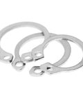 Stainless Steel C Clip Circlip External Retaining Rings Set 9mm To 14mm in close-up, showing individual rings' design and material