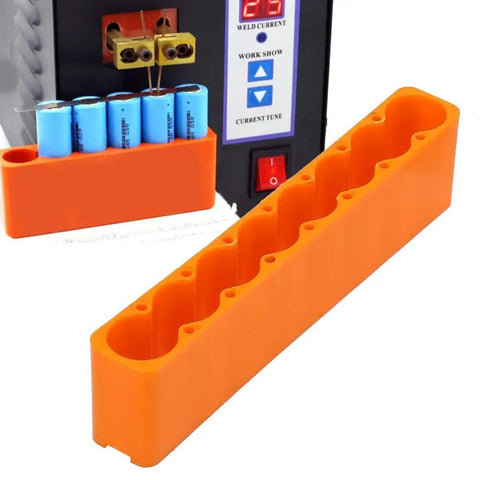 Top Grade 2PC Adjustable Battery Pack Spot Welding Clamps Made From High Heat Resistant Industrial Plastic, Stop Rolling For Easy Install And Solid Grip In Any Project, orange battery holder with cylindrical cells.
