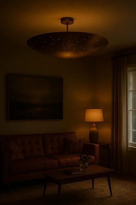 Luxury Handcrafted Brass Pendant Light, Vintage Dome Ceiling Fixture illuminating a cozy living room setting.