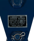 Close-up of label on 8 Ton Snatch Block with 6 inch sheave, wire rope size 3/4 inch, industrial grade blue heavy duty load block.