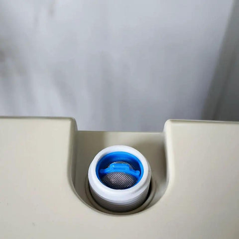 Close-up of Must-Have Pro-Grade Stainless Steel Washer Inlet Valve Filter Screen Kit installed on washing machine inlet.