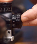 Adjusting No Fuss Optic Leveler For Rifle Scopes With Leveling Feature, Fits Rings Or One Piece Mounts for long-range accuracy.