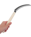 Serrated Weeding Tool With Wooden Handle For Easy Weeding And Harvesting In The Home Garden And Field, shown in hand for scale.