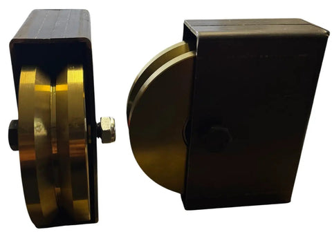 Bulletproof 6 Inch Chrome V Groove Wheels With Box Mount Rock Solid Five Eighth Axle Compatible Track Rollers 3000 LB Payload black and gold pulley design.