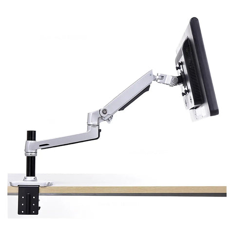Full Motion Monitor Desk Mount Accommodates 17 To 32 Inch Displays Featuring Rugged Aluminum Spring Arm in use.
