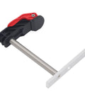 Top Notch Stainless Steel Hold Down Clamps Set Quick Release Bench Dogs Killer For Woodworking Drilling Tables Shop Benches Groove Mounts Rugged Workshop Gear close-up of clamp with stainless steel arm and red handle