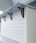 Cabinet with black metal brackets beneath a countertop, featuring Miller Powder Coated Black Two Piece Millwork Kit One And A Half Inch Wide By Ten Inch Deep By Twelve Inch High Cabinet Trim And Accent Molding For Shelves And Doors Easy Install For DIY Projects