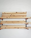 Orange Lumber Storage Rack, 3-Level System, Holds 110 Lbs Per Level, adjustable width, mounted on wall with wood planks
