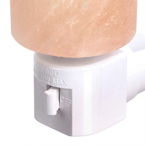Close-up of Pink Himalayan Salt Plug-In Night Light in Cylindrical Crystal Shape with power switch visible