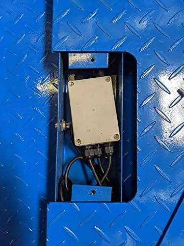 Close-up of junction box on Beefy Industrial Floor Scale for Warehouses and Shipping, 36 by 36 inch steel pallet scale