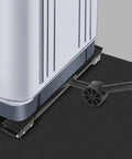 Close-up of Premium Black Furniture Movers With Wheels and Heavy Duty Stainless Steel Sliders under a washing machine for easy relocation.