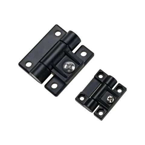 Pair of small black plastic cabinet hinges with mounting plates and screw holes.