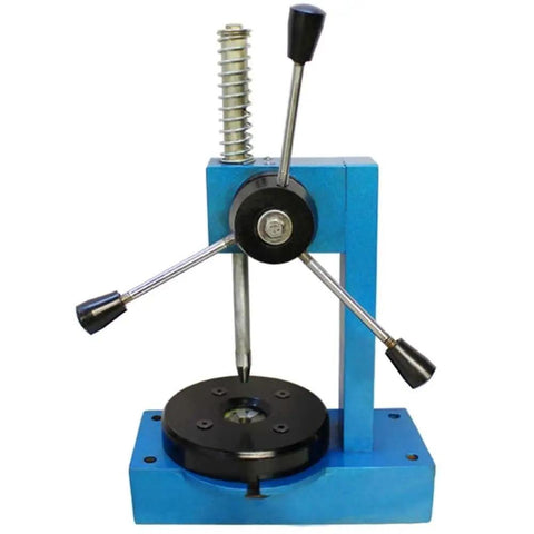 Heavy Hitter Ring Expander Stretcher Machine Featuring Smooth Operation And Killer 12 Piece Collet Set for resizing rings on a jewelry bench.