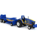 One Sixty Four Scale FFA Die Cast Pulling Tractor With Sled Nine Inch Long Farm Toy showcasing blue die-cast tractor and sled.