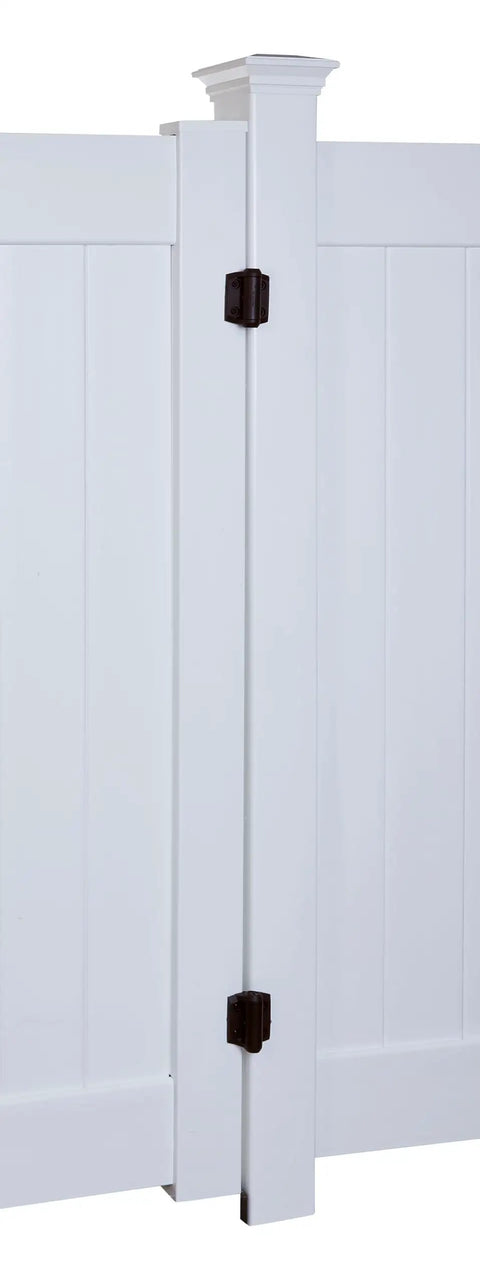 TruClose Narrow Spring Hinges 2-Pack Self-Closing Gate Hardware in black polymer on white metal outdoor gate with adjustable spring action.