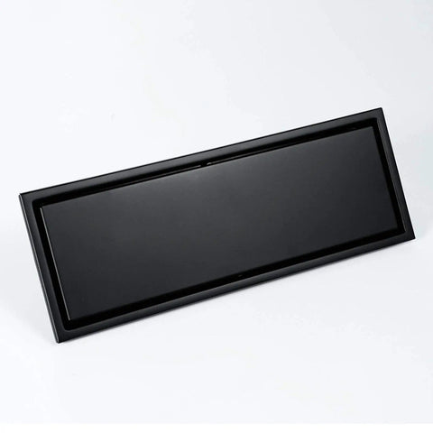 Heavy Duty Stainless Steel Linear Floor Drain With Brushed Gold Finish Anti Odor Tile Insert For Bathroom Shower Hassle Free Removable Hair Catcher Cover Top Shelf Rectangular Design in black color.