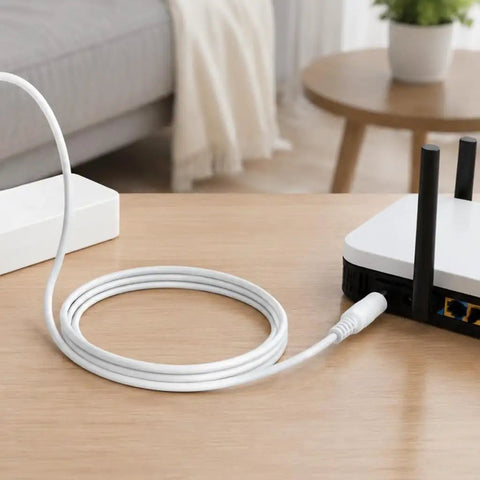 Male To Female Power Extension Cord With Rock Solid Molded Grip Housings For Routing Existing Power Cable And Getting That Long Run on wooden table.