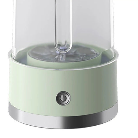 Compact Portable Washer For Delicate Laundry With Three Spin Settings Quiet Eco Friendly Design Featherweight Build Perfect For Dorm Digs Apartment Life Weekend Road Trips And Daily Freshening Up Green Finish close-up of control panel and green base.