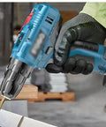 Premium Multifunctional Cordless Electric Drill Kit Featuring Badass Torque Copper Core Motor Quick Charge in use drilling.