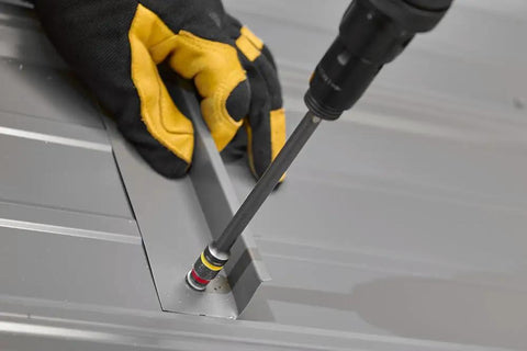 Dual Sided 6 Inch Magnetic Hex Chuck Driver with Reversible Hex Socket in use on metal surface