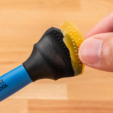 Close-up of Easy Clean Silicone Glue Spreader for Biscuit Joinery With Dual End Design featuring biscuit-tip.