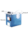 Heavy Duty Portable Table Saw Station With Slick Dustless Operation And 1100 Watt Motor For Worry Free Woodworking And Compact Job Site Rig. Side view showcasing safety switch and working table.