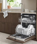 Swedish Engineered Integrated Dishwasher 60 Cm Wide with clean dishes in baskets, set in modern kitchen cabinetry.