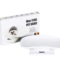 Newborn Pet Weight Scale With 12 By 8 Inch Tray And Tape Measure showcased with packaging, white kitchen style design.