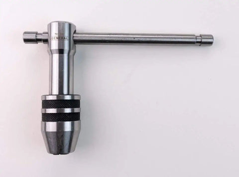 Two Piece Tap Wrench Set With Sliding T Handle And Reference Table For Zero To One Half Inch Taps Ideal For Precise Threading And Straight Holes