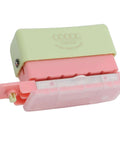 Grab And Go 5 Hole Paper Puncher Mini Handheld Circle Punch Tool in pink and green for A4 A5 B5 paper sizes crafting and scrapbooking.