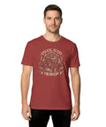 Vintage Engineer T-Shirt With Retro Hot Rod Emblems Gear And Grease Designs Perfect Gift For Auto Mechanics Working On Garage Projects Or Car Restorations. Adult male model wearing a red cotton tee with grease and gear design.