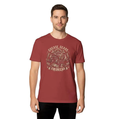 Vintage Engineer T-Shirt With Retro Hot Rod Emblems Gear And Grease Designs Perfect Gift For Auto Mechanics Working On Garage Projects Or Car Restorations. Adult male model wearing a red cotton tee with grease and gear design.
