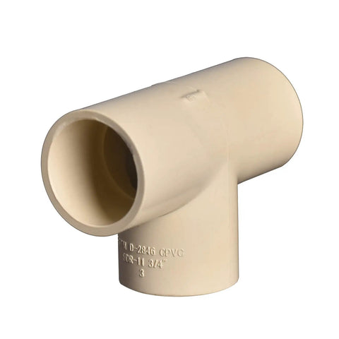 Close-up of beige 3/4 inch CPVC tee fitting, slip to slip socket for DIY home plumbing, hot and cold water system, corrosion resistant, durable