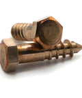 Silicon Bronze Lag Screws 5/16 Inch By 2 Inch, Set Of 25, Beefy Heavy Duty Wood Fasteners for Lumber Framing, shown close-up