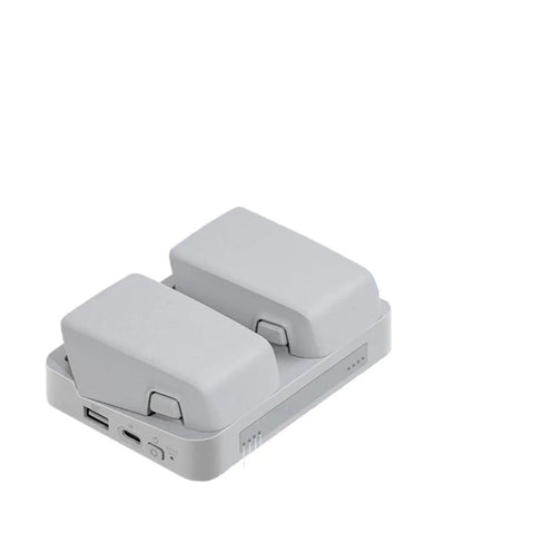 Flip Drone Dual Battery Charging Hub 2-Way Power Bank Charger Station with two batteries docked for drone accessories.