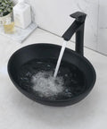 Oval Black Vessel Sink With Faucet And Drain Combo 16 By 13 Ceramic Bathroom Sink Above Counter Vessel filled with water