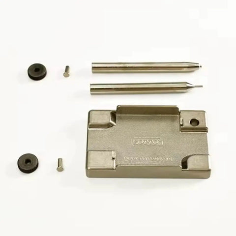 Heavy Duty 5 Piece Lighter Repair Kit With Dual Steel Wheels Knockout Rivet Removal And Flange Setting Punches showing steel tools and repair base.