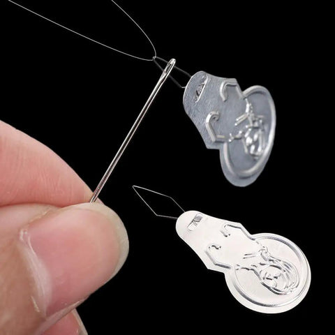 40Pcs Aluminum Needle Threader Set, Gourd Shaped Retractable Threaders in use threading needle, close-up view