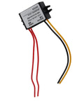 Badass Waterproof Step Down Voltage Converter AC DC Power Module With IP67 Sealing And Overload Protection Zero Hassle 12V Adapter Up To Five Amps For Weekend Whip Mods showing wires attached for installation.