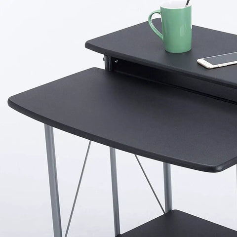 Adjustable Height Sit Stand Workstation Mobile Standing Desk Foldable Computer Table With Sturdy Waterproof Surface, black top and steel frame.