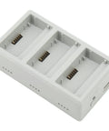 Drone Charging Station 3 Port Hub For Mini 3 Pro And Mini 3 Batteries Fast 5V 9V 12V 3A Input Eight Point Five Volt Three Point Eight Amp Output Portable Travel Outdoor Charger, gray hub close-up with three battery slots