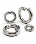Close-up of 304 Stainless Steel Spring Lock Washers With Elastic Gasket, vibration-resistant, in silver, various sizes displayed.