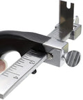 Close-up of Leather Strap Cutter With Aluminum Handle And Stainless Steel Gauge Ruler, highlighting 4 inch scale and adjustment knob.