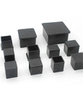 Heavy Duty Rubber Furniture Glide Caps Square Chair Leg Covers Non Slip Floor Savers Rock Solid Grip Easy Breezy Slide On Install Scratch Proof Pad Bulk Pack For Hardwood And Tile Floors black square caps arranged on a white background.