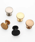 Assorted metallic cabinet knobs including 10 Pack 1-1/5 Inch (30mm) Cabinet Knobs Matte Black For Cabinets, Dresser, And Kitchen Drawers.