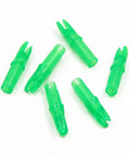 Green Press-In Arrow Nocks For Carbon Arrows.244/.246 Throat, 50 Pack Plastic Nocks scattered on white background