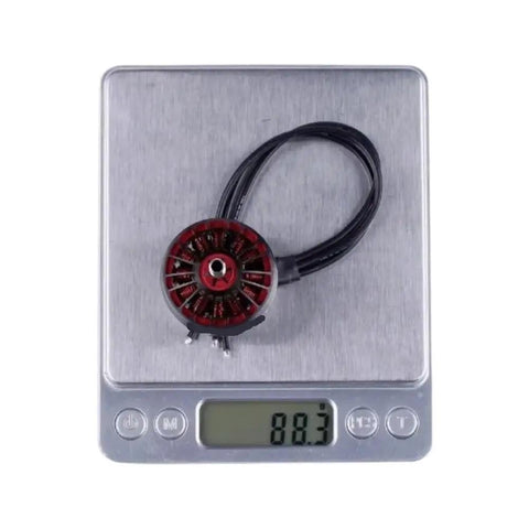 2814 Brushless Motor 880KV 1100KV for FPV Drone Racing on scale showing weight, lightweight design for quadcopters