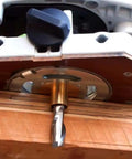 Pro Grade Router Template Guide Set Featuring Precise Metal Bushings mounted on a router, showing brass bushing and bit.